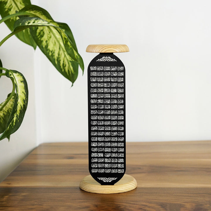 siyah metal uzerine beyaz uv ile esmaul husna yazili alt ve ust kisminda bulunan ahsap mum standi ile dekoratif bir urundur islamicwallarttr