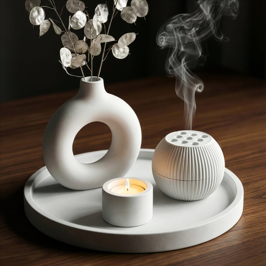 minimalist tasarima sahip beyaz küre buhurdanlik tutsu kullanimina zarif bir dokunus katar islamicwallarttr